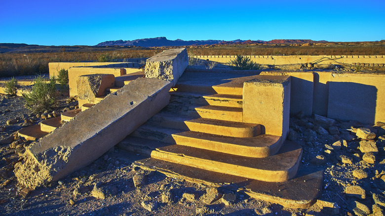 Ruined steps with concrete slab and blue sky St. Thomas Nevada