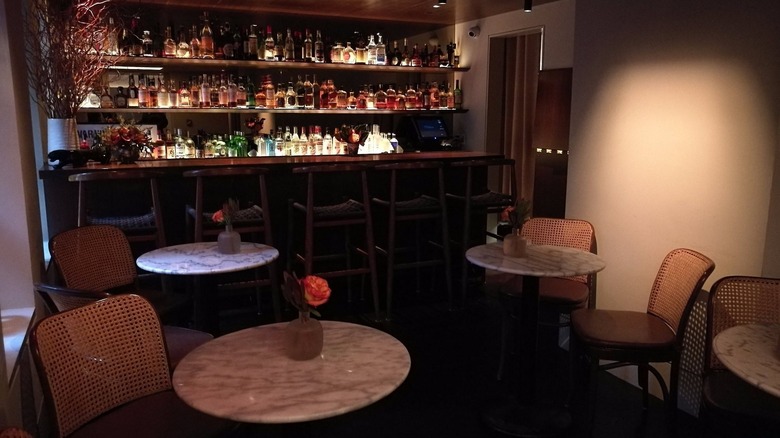 The interior of Il Gattopardo, showing a bar and tables