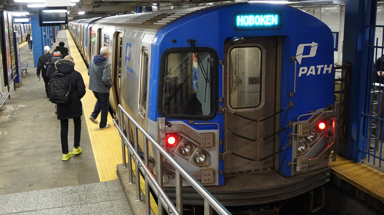 People boarding a subway in New York