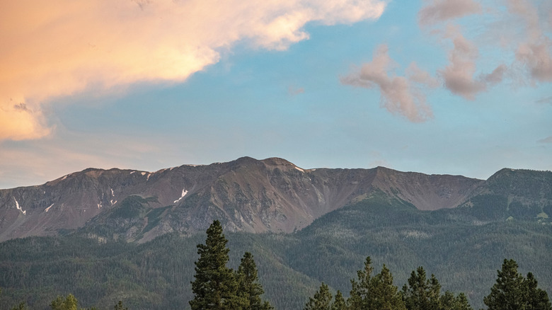 The sunset sky and clouds over the Wallowa Mountains in Eastern Oregon.