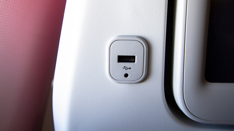 USB socket for mobile charger in airplane