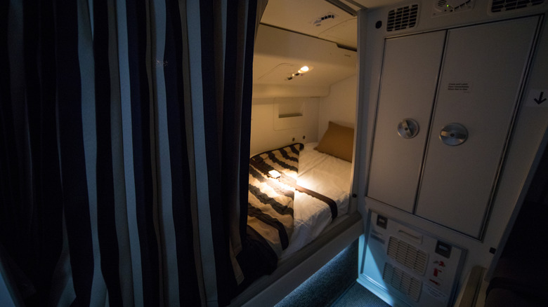 Bunk bed under the roof of an aircraft