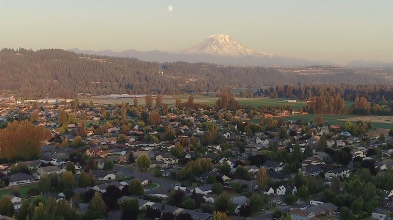aerial view over sumner's residential neighborhood with Mt Rainier in the background on the horizon