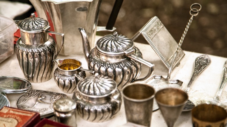 Antique silver teapots and tableware