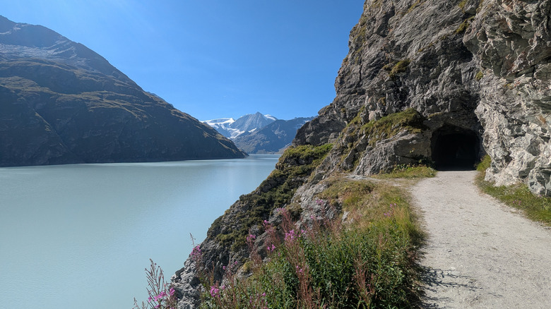 Hiking pathway near Lac des Dix in Valais Switzerland  goes through a tunnel.