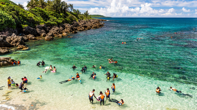 People snorkeling at Wanlitong beach in Taiwan