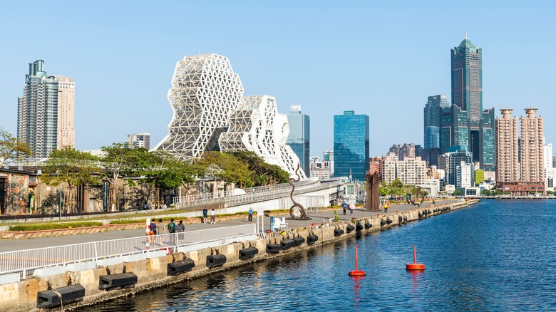 Pier2 Art Center in the port of Kaohsiung, Taiwan, with the landmark Kaohsiung Music Center and 85 Sky Tower