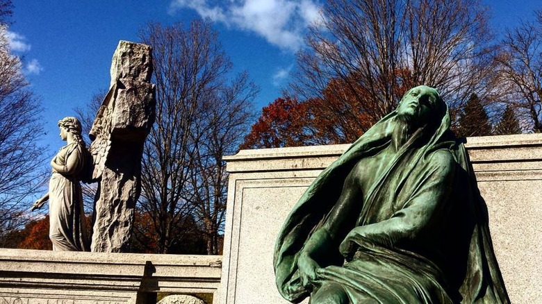 The bronze statue of Black Agnes on a sunny day in Green Mount Cemetery, Montpelier, Vermont