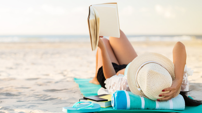 Woman reading on the beach