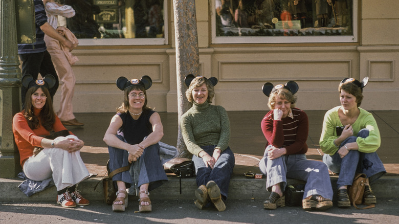 Five women wearing Mickey Mouse ears at Disney World in 1974