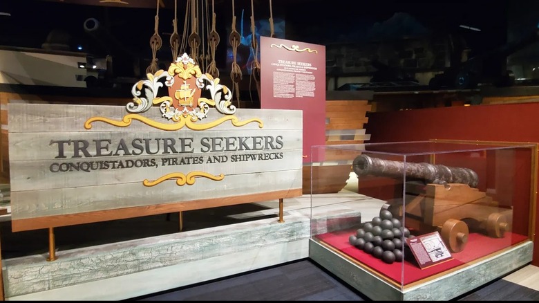 A metal canon at a pirate history exhibit at the Tampa Bay History Center.