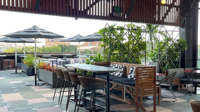 The open-air interior of M.Bird rooftop bar in Tampa