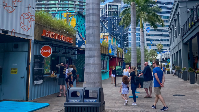 People walking to Jeni's Ice Cream at Sparkman Wharf