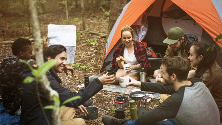 A group of campers dining