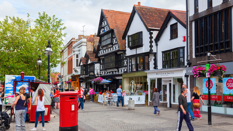 High street walk with traditional houses and red post box