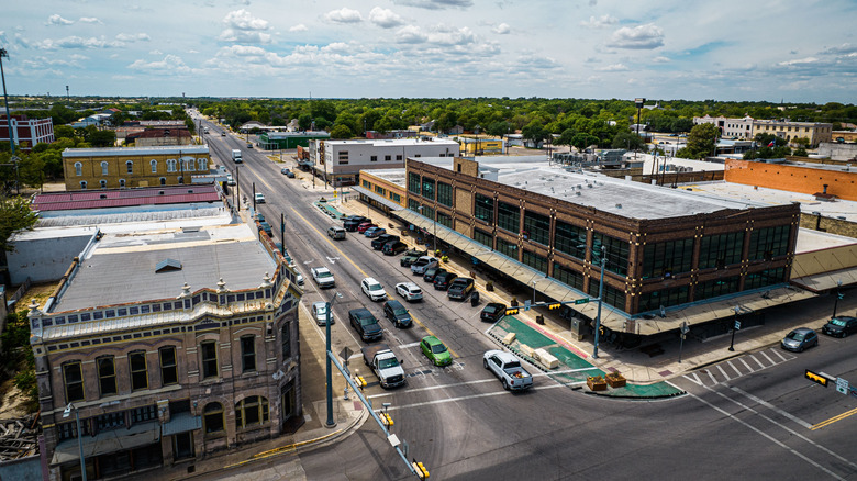 Downtown Taylor, Texas, with its historic buildings on a busy day