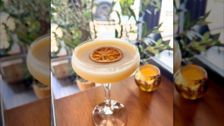 Yellow cocktail on wooden table, Lebanon Public House