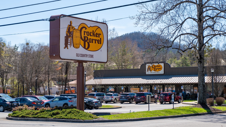 Sign and parking lot of Cracker Barrel in Pigeon Forge, Tennessee