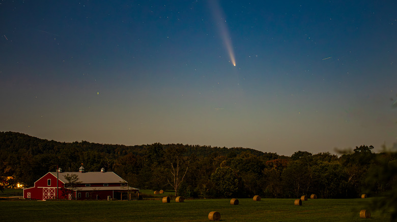 Comet in the night sky over a farm in Tennessee