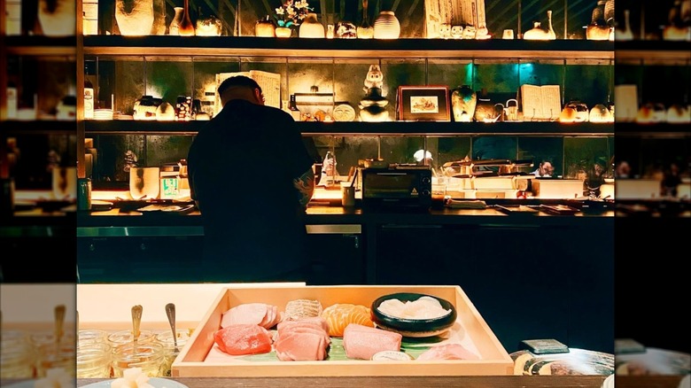The chef behind a box of sushi at Kase x Noko in Nashville, Tennessee