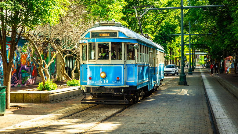 A blue trolley street car in Memphis