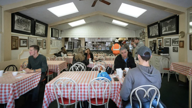 Interior of Varallo's with customers dining at tables