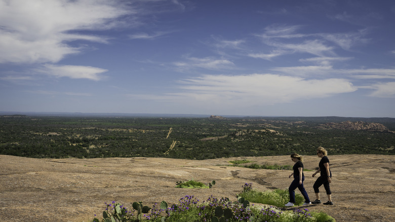 Hikers at the top of Enchanted Rock