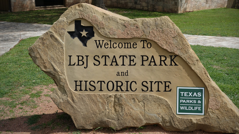 Stone entrance signage for the Lyndon B. Johnson State Park and Historic Site in Stonewall, Texas.