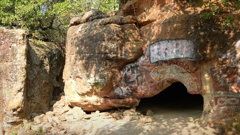 Animal den rocks covered with graffiti