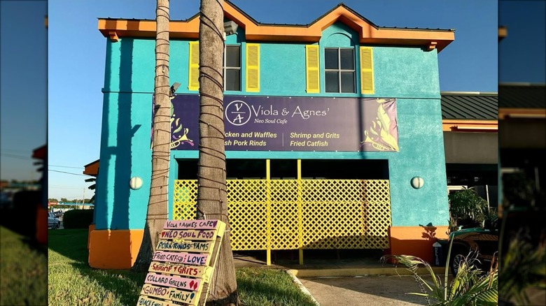 The blue and yellow front of Viola and Agnes' Neo Soul Cafe