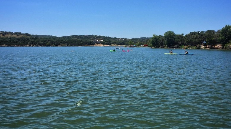Boerne City Lake Park with kayakers in the distance