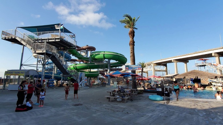 A view of a green slide at Hurricane Alley Waterpark