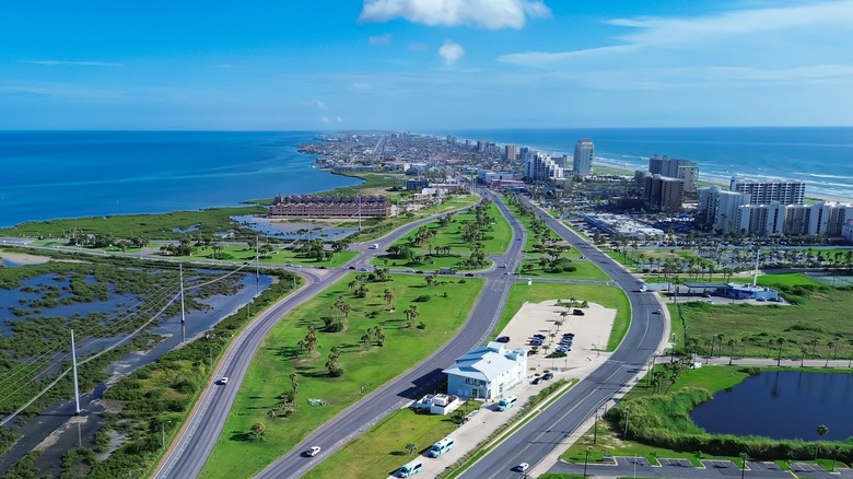 Aerial view of city and highway running along Laguna Madre on the Gulf Coast of Texas