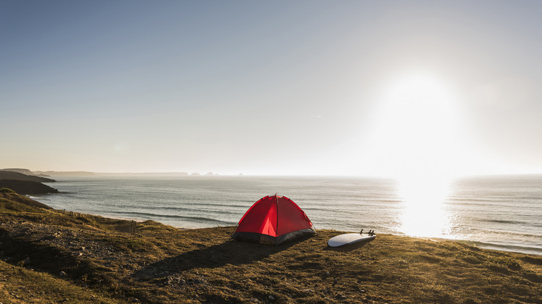 A camping tent on a beach shore