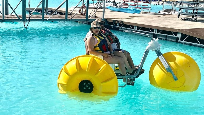 A couple enjoys a tandem bike at Lago Mar in Texas City