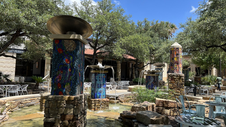 Colorful mosaic fountains and outdoor seating at The Shops at La Cantera in San Antonio