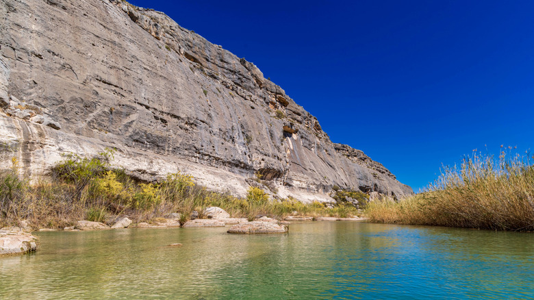 The imposing cliff faces along the Pecos River