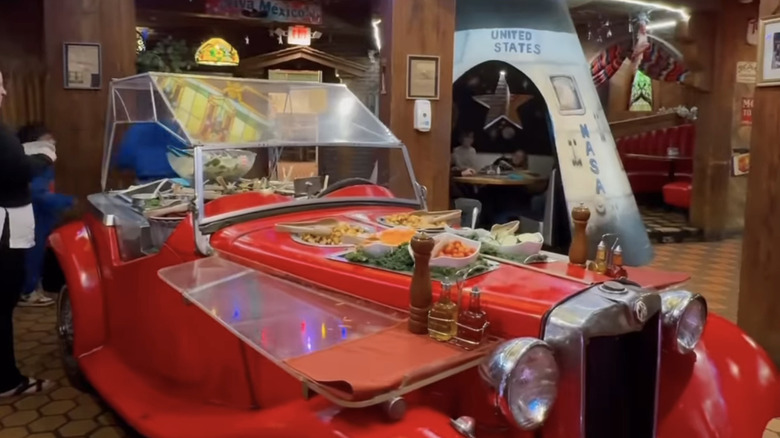 An old car serving food at the Magic Time Machine in Dallas