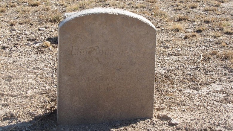 A gravestone inscribed "Little Margaret"