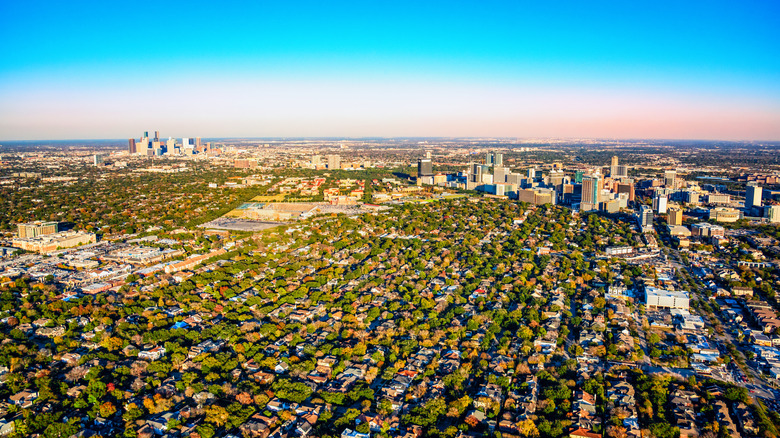 wide-angle view of metropolitan area of Houston with city skylines in distance