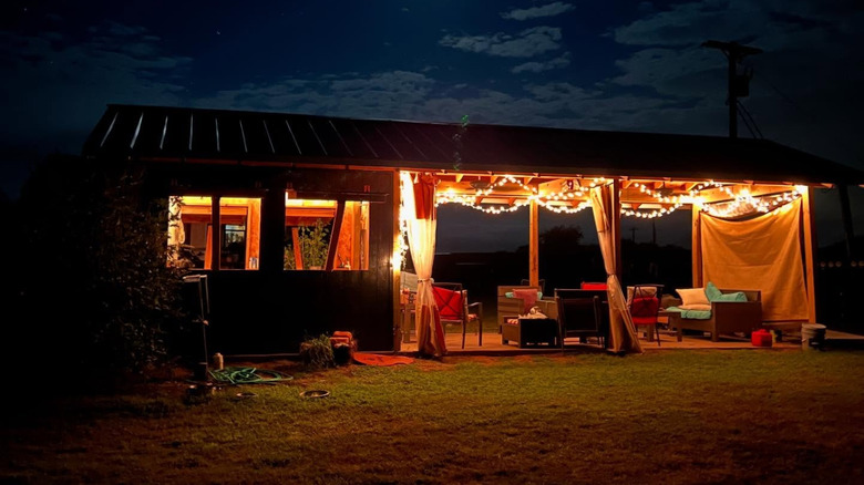The communal "kitchen" space at The Bird's Nest, all lit up at night