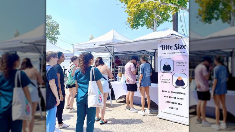 People line up for a Japanese rice balls at local farmers market