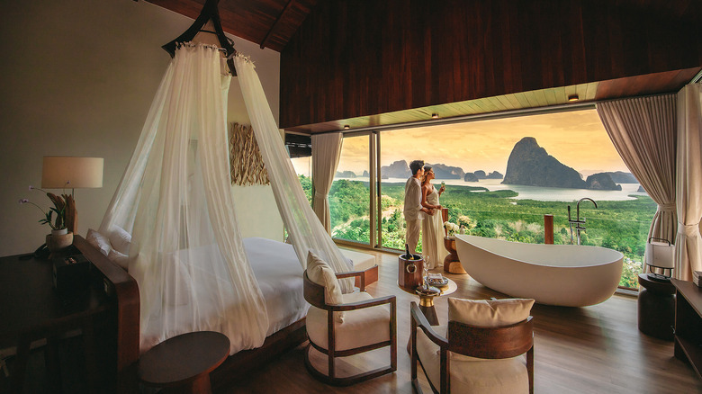 View of Phang Nga Bay from inside one of the luxury villas at Sametnangshe Boutique hotel in Phang Nga, southern Thailand, at sunset