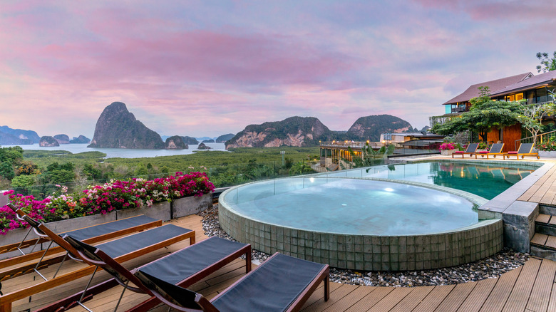 View of Phang Nga Bay from the pool area of Sametnangshe Boutique hotel in Phang Nga, southern Thailand, at sunrise