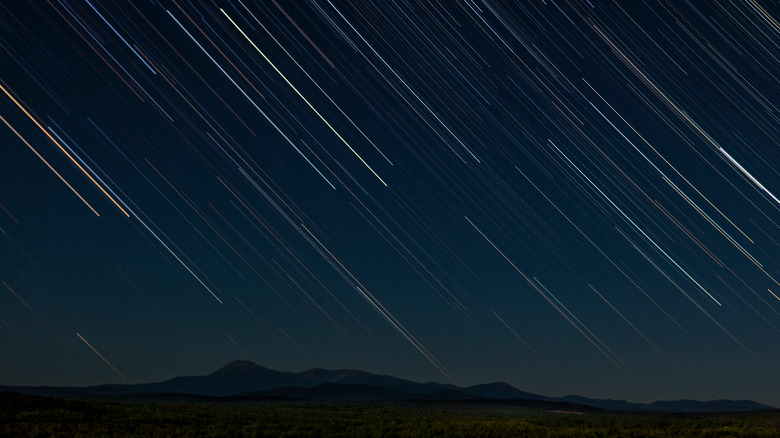 Long exposure of star trails over Katahdhin Woods