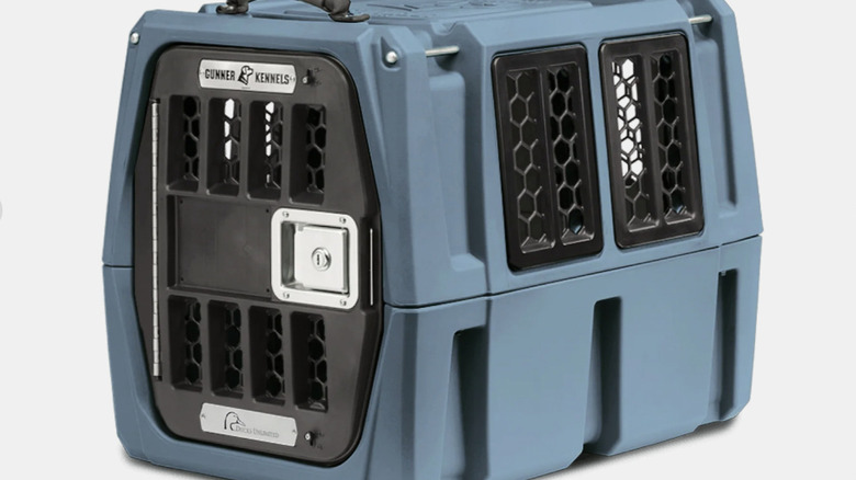 View of Gunner G1 Kennel in Ducks Unlimited blue special edition color sitting on a white background