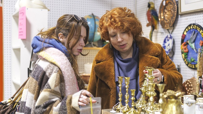 A mother and daughter shopping for antiques