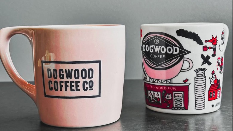 Two cups of coffee featuring the Dogwood Coffee logo