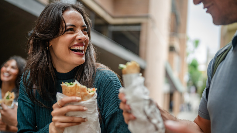 People eating sandwiches