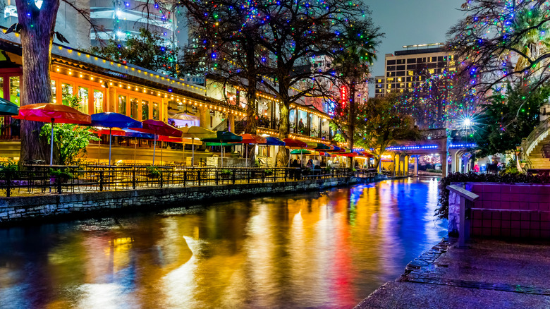 Night Time Scenic Views of the Riverwalk with Christmas Lights on a Rainy Day at San Antonio, Texas.